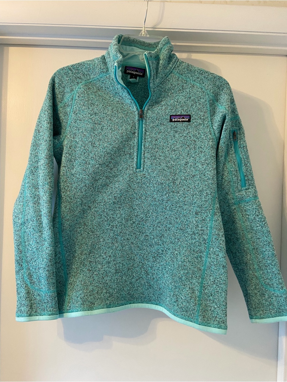 Patagonia light teal quarter-zip fleece pullover